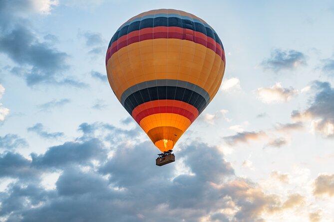Affordable Hot Air Balloon Ride Over Cat Valley with Hotel Pick-up & Drop-Off - Cat Valley sunrise: a different Cappadocia view than the Göreme crowds