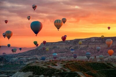 Balloon Watching Tour in Cappadocia with Hotel Pick-Up & Drop-Off - Love Valley: fairy chimneys and balloons in the same frame
