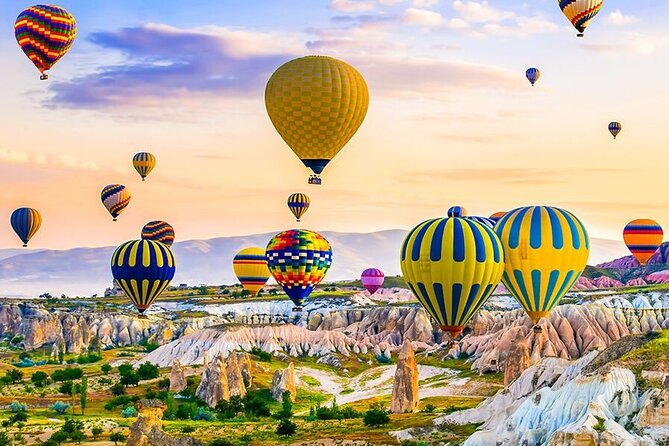 Balloon Watching Tour in Cappadocia with Hotel Pick-Up & Drop-Off - Rose Valley: soft pink morning light and a calm finish