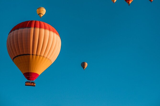 Cappadocia: Hot Air Balloon Tour Sunrise Flight - Love Valley from above: pink-and-gold morning views