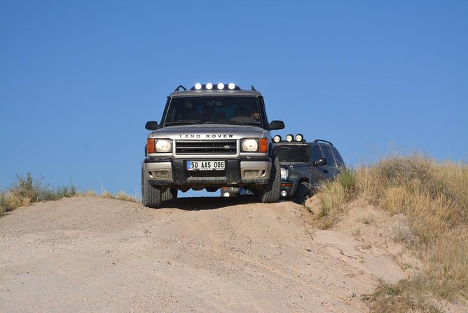 Cappadocia Jeep Safari with Hot Air Balloon Watch at Sunrise - Stop 3: Love Valley, following balloons from the ground