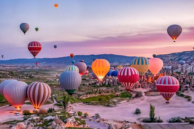 Cappadocia Sunrise Hot Air Balloon Watching Tour With Audio Guide - Stop 1: Aydin Kiragan Tepesi for near-takeoff energy