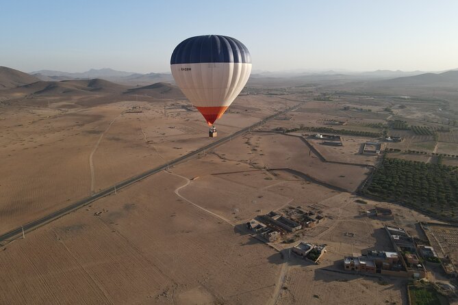 Fly in a hot air balloon in the sky of the Atlas in Marrakech - The Flight Over the Atlas: Sunrise Views, Quiet Air, and Pilot Control