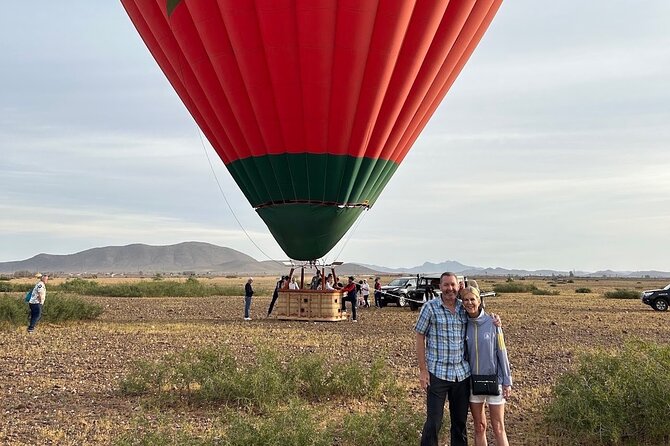 Hot air balloon flight in the desert with camel ride - The desert camp welcome: Berber setting, drinks, and a campfire