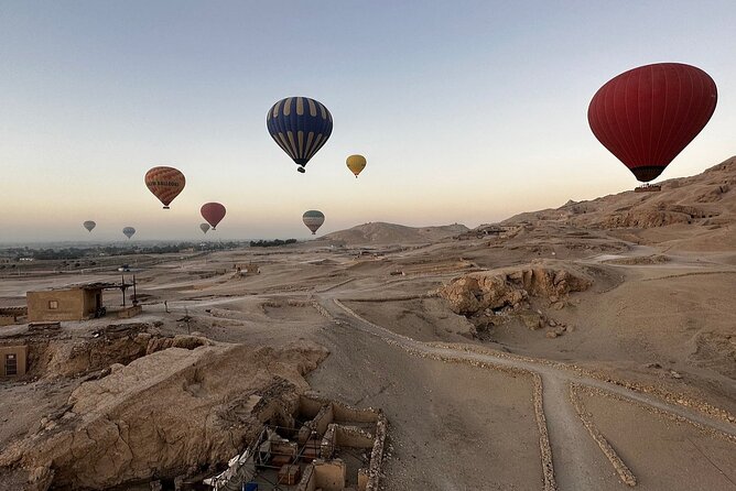 Hot air balloon ride in Luxor with hotel delivery service - Colossi of Memnon and the wide West Bank sweep