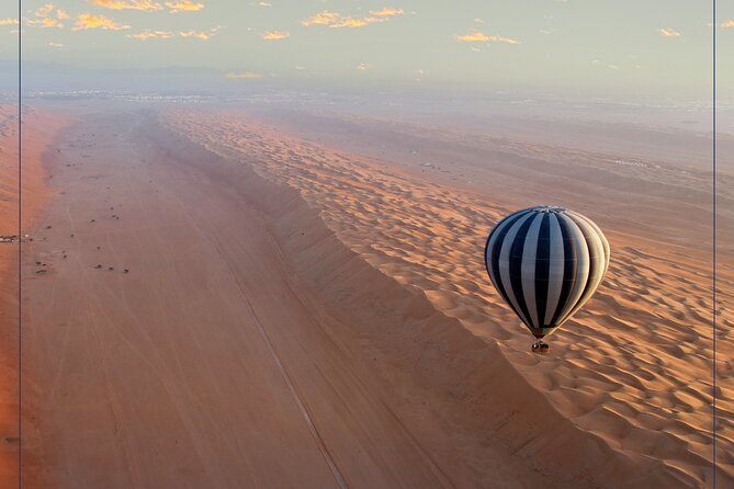 Hot Air Balloon Tour at Wahiba Sands - Landing and the commemorative medal: a satisfying finish to the ride