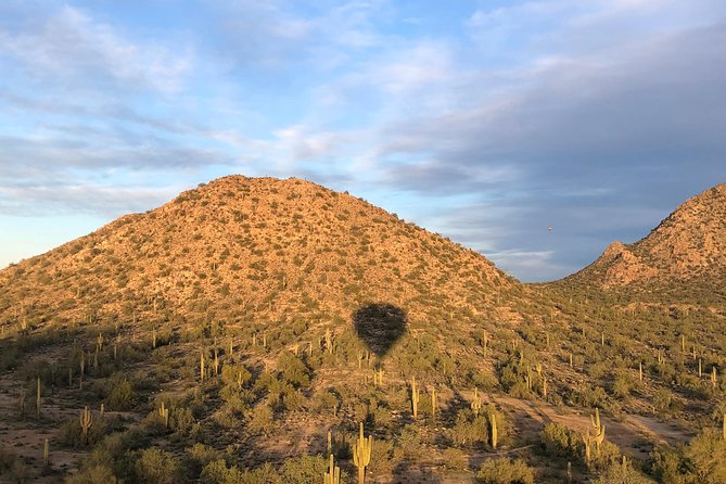 Phoenix Afternoon Hot Air Balloon Ride with Bubbly + Charcuterie - Balloonists Ceremony on landing night: linens, china, Champagne, and Vincent’s