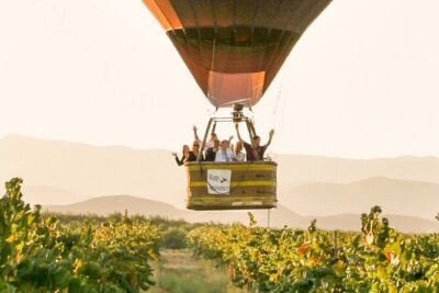 Sunrise Hot Air Balloon Flight over the Temecula Wine Country - Europa Village meet-up and the champagne-toast energy
