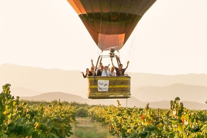 Sunrise Hot Air Balloon Flight over the Temecula Wine Country - Europa Village meet-up and the champagne-toast energy